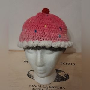 Hand made cupcake hat with a cherry on top.